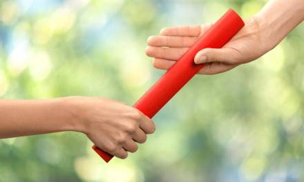 Teaching young athletes how to pass the relay baton